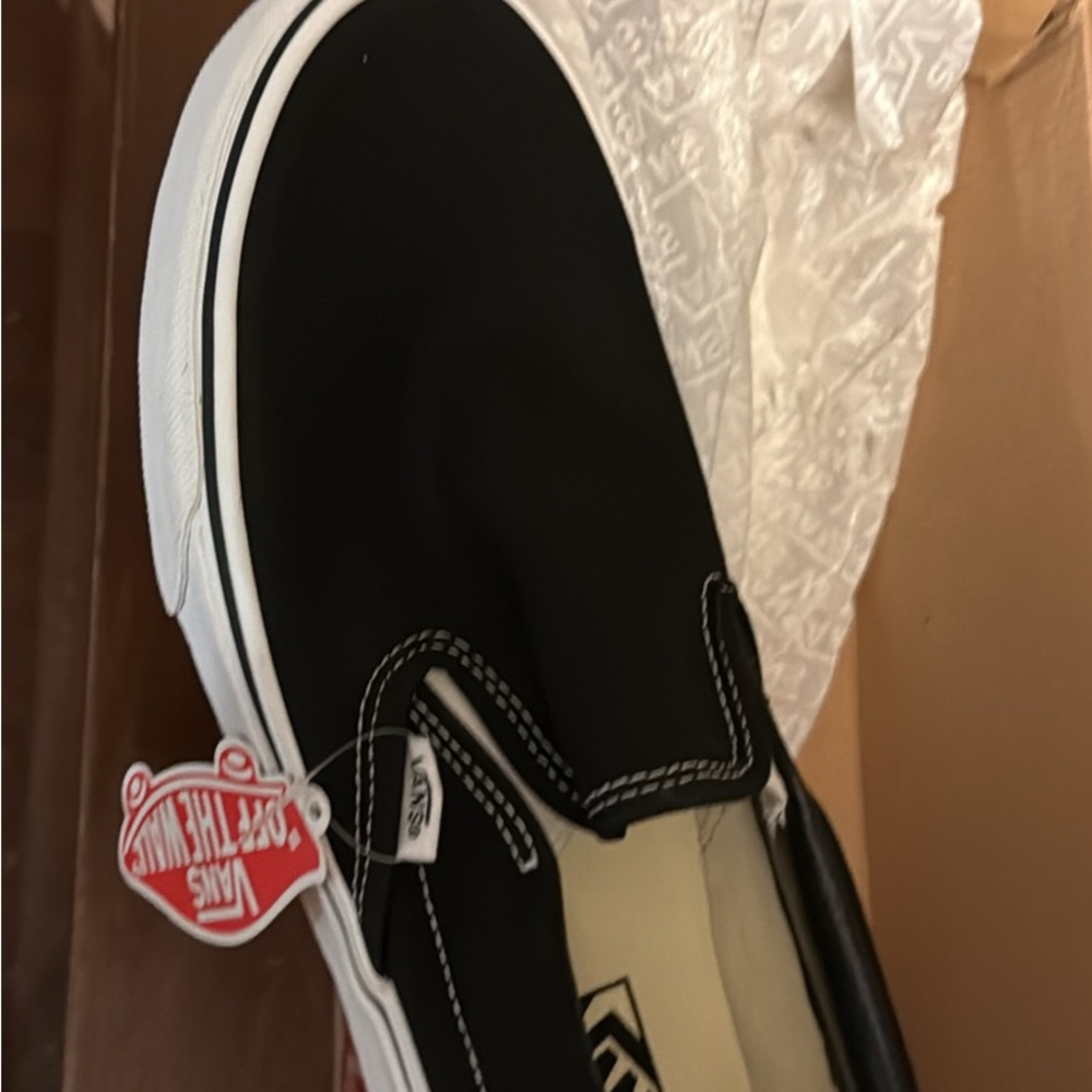 Vans Black and White Slip-On Shoes